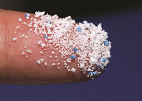 Microplastics on a finger